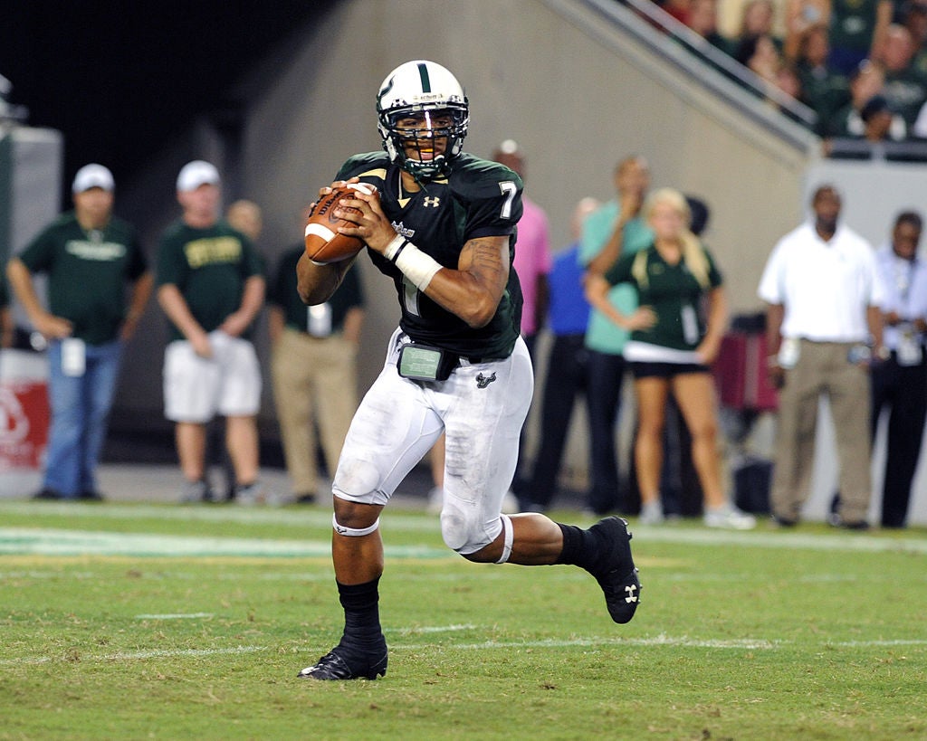 Quarterback B.J. Daniels #7 of the University of South Florida Bulls looks to pass during a game.