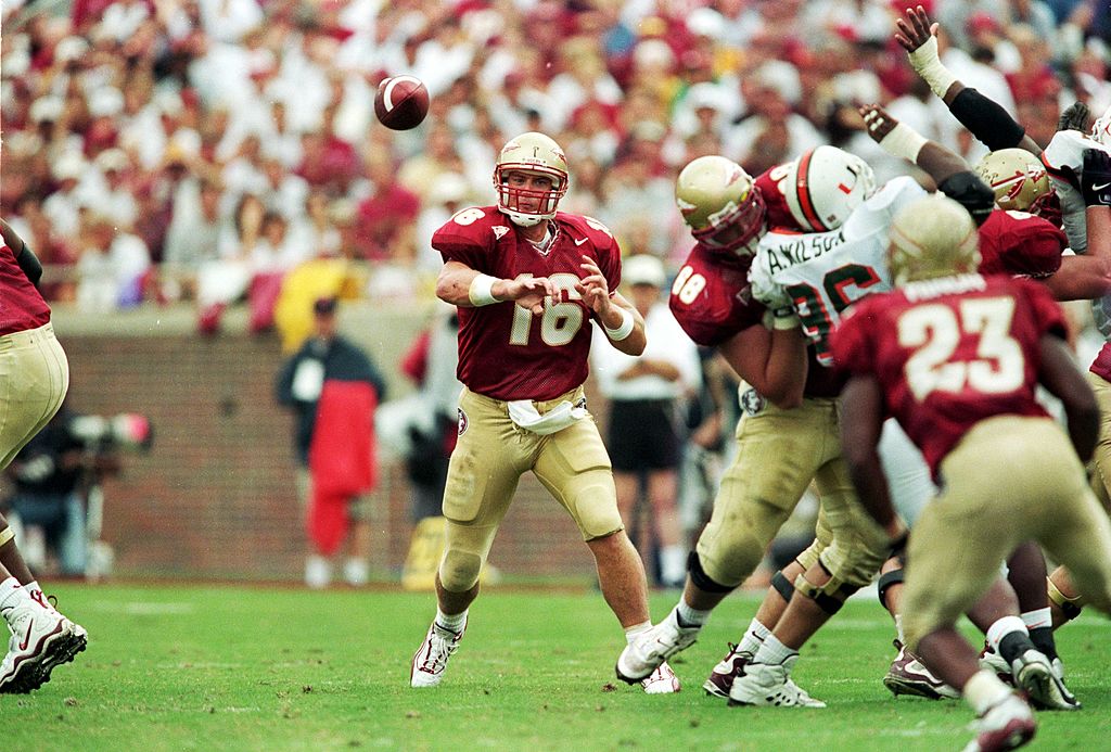 Chris Weinke #16 of the Florida State Seminoles passes the ball during a game against the Miami Hurricanes.