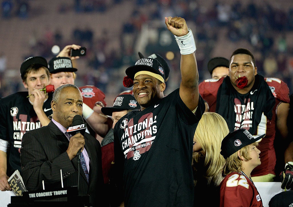 Quarterback Jameis Winston #5 of the Florida State Seminoles celebrates after defeating the Auburn Tigers in the 2014 BCS National Championship Game.