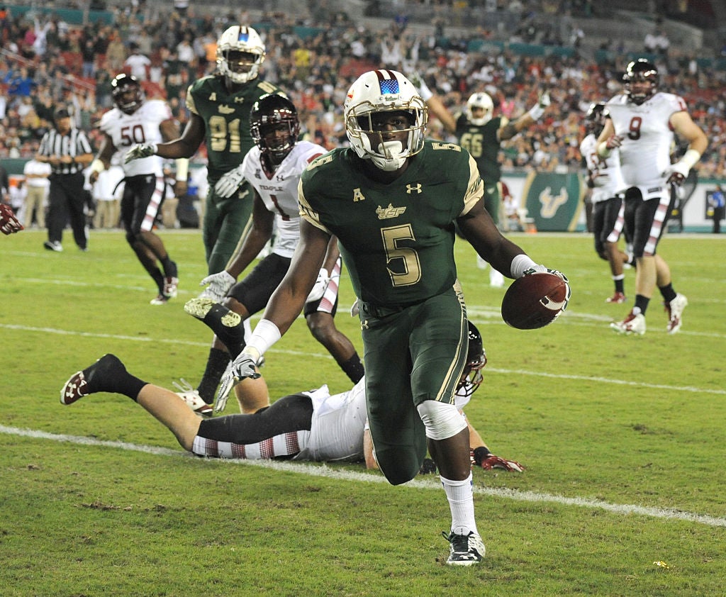 Running back Marlon Mack #5 of the South Florida Bulls runs in for a touchdown against the Temple Owls.